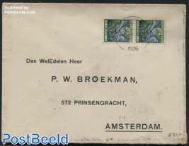 A pair of syncopated perforations nvhp no. R75 on a cover to Amsterdam